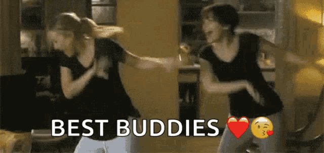two women are dancing with the words best buddies in the corner