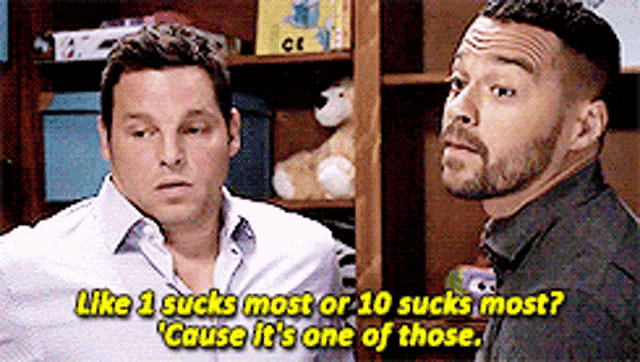 two men standing next to each other with one saying like 1 sucks most