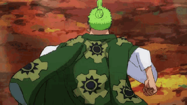 a man with a green cape with gears on it