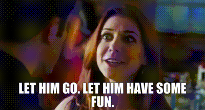 a woman is smiling and talking to a man and says `` let him go , let him have some fun . ''