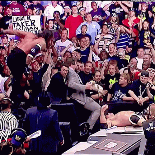 The Undertaker Batista GIF - The Undertaker Batista Leg Drop GIFs