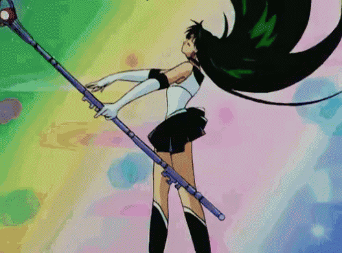 a girl with long black hair is holding a long stick in her hand .