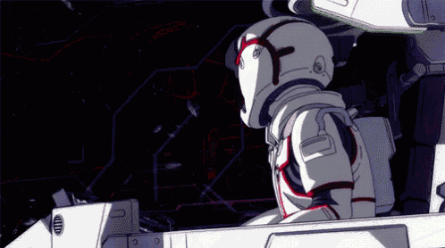a man in a space suit is sitting in a cockpit of a space ship .