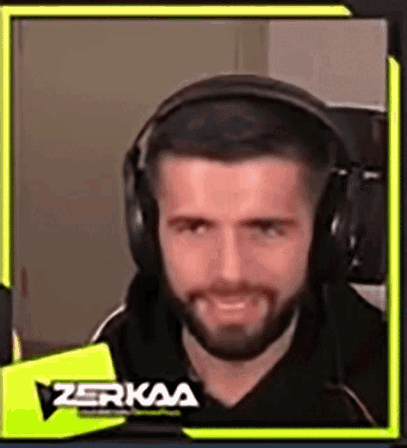 a man with a beard is wearing headphones and has the name zerkaa on the bottom