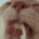 a close up of a person 's face with blood on it .