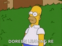 homer simpson is standing in the grass with the words `` doreen leaving re '' behind him .