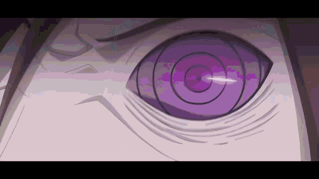 a close up of a purple eye with a swirl in it