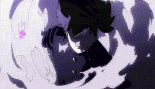 a close up of a person 's face in a dark room with purple smoke coming out of it .