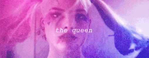 a close up of a woman 's face with the words `` the queen '' written over it .