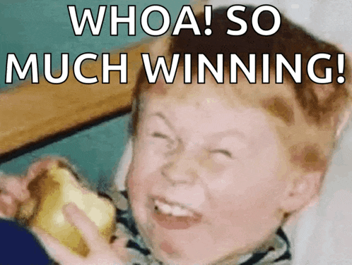 a boy is holding a sandwich with the words whoa so much winning written on it