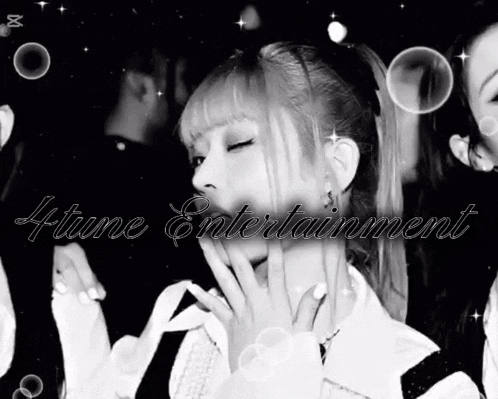 a black and white photo of a girl with the words 4tune entertainment written on the bottom