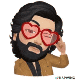 a man with a beard and heart shaped glasses
