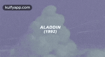 a purple background with the words aladdin ( 1992 ) on it .
