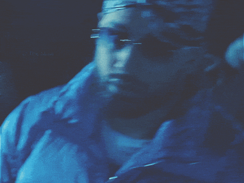 a blurry picture of a person 's face with the words " the way " on the bottom right
