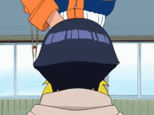 a cartoon character 's head is being held upside down by another character 's arm