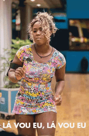 a woman in a colorful dress with the words " la vou eu " on the bottom
