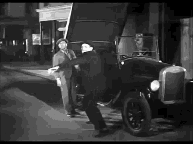 Oliver Hardy Stan Laurel GIF - Oliver Hardy Stan Laurel Cops GIFs