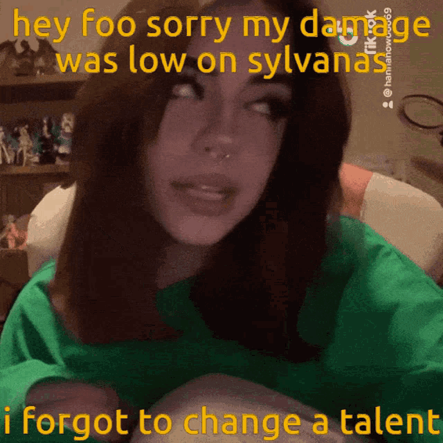 a girl in a green shirt says " hey foo sorry my damage was low on sylvana "