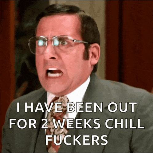 a man in a suit and tie is making a funny face and says i have been out for 2 weeks chill fuckers