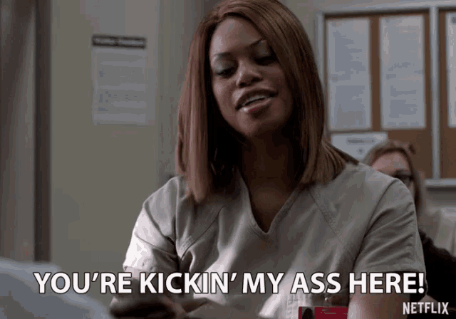 a woman says you 're kickin ' my ass here on a netflix ad