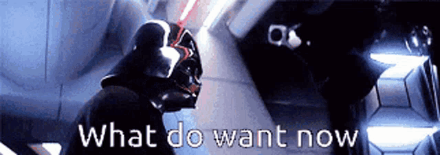 darth vader is holding a lightsaber in front of a sign that says " what do want now "