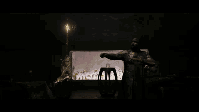 a bright light is shining through a dark room