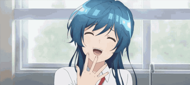 a girl with blue hair is sitting in front of a window and smiling