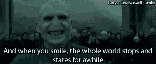voldemort from harry potter is smiling in front of a crowd of people with a quote .