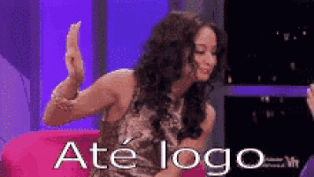 a woman in a dress is sitting on a pink couch with the words até logo written on the bottom
