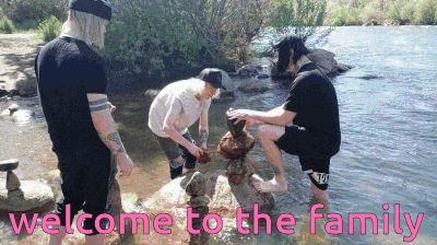 a group of people are standing in the water with the words welcome to the family written on the bottom