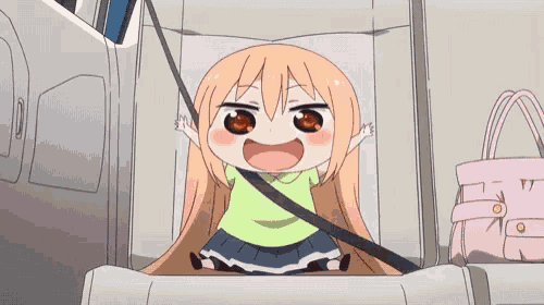 a little girl is sitting in a car seat with a seat belt on .