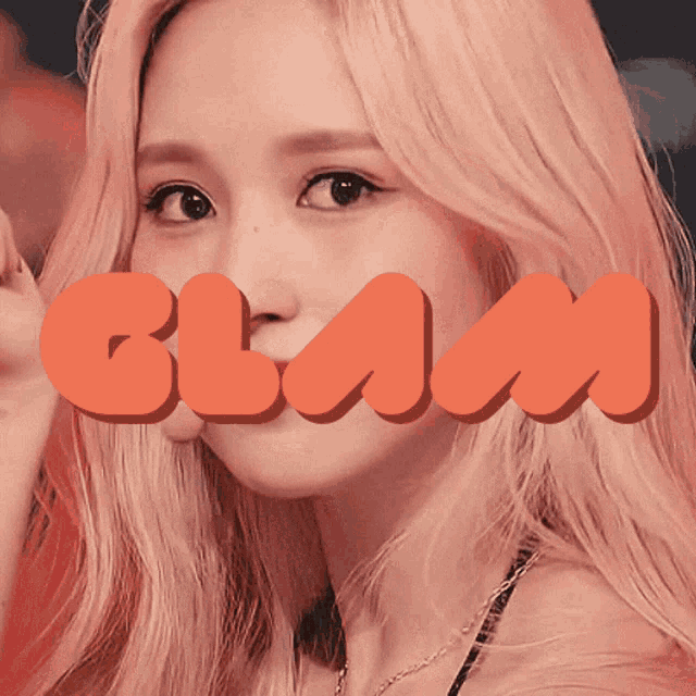 a woman 's face is behind the word glam