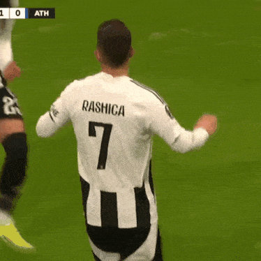 a soccer player with the name rashica on his jersey