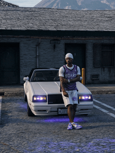 a man wearing a boars jersey is standing in front of a white car