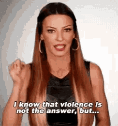 a woman is saying that violence is not the answer , but .