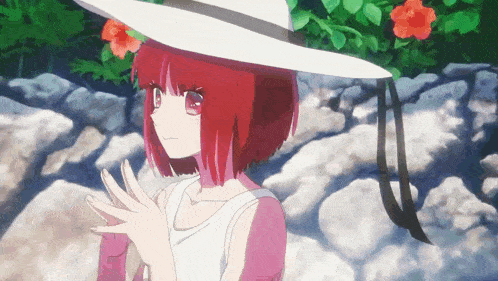 a girl with red hair wearing a white hat and a white tank top
