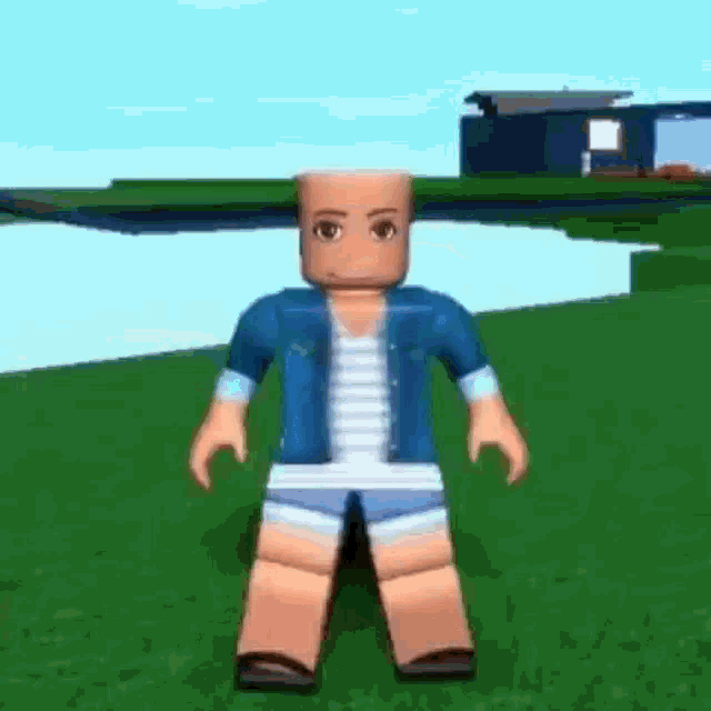 a roblox character is sitting on the grass in front of a house in a video game .