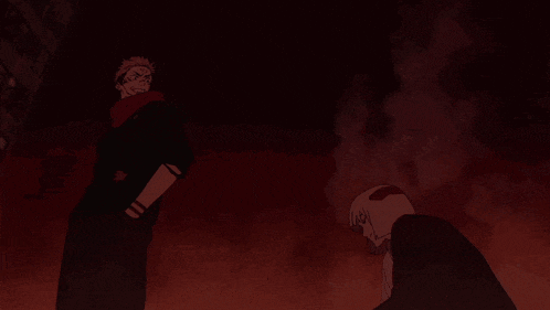 a man and a woman are standing in front of a fire