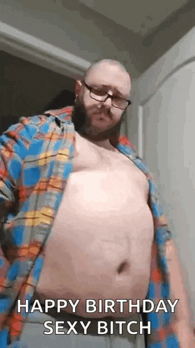 a man in a plaid shirt is taking a picture of himself and says `` happy birthday sexy bitch '' .