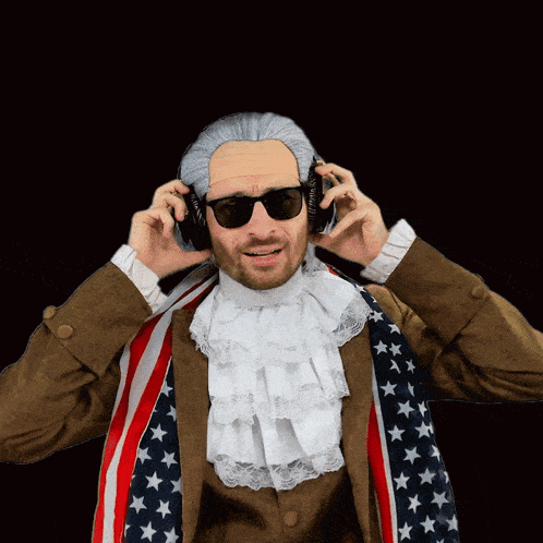 a man in a wig and sunglasses is wearing headphones and an american flag scarf