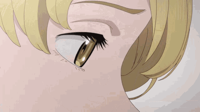 a close up of a blonde anime girl 's face with a microwave in the background