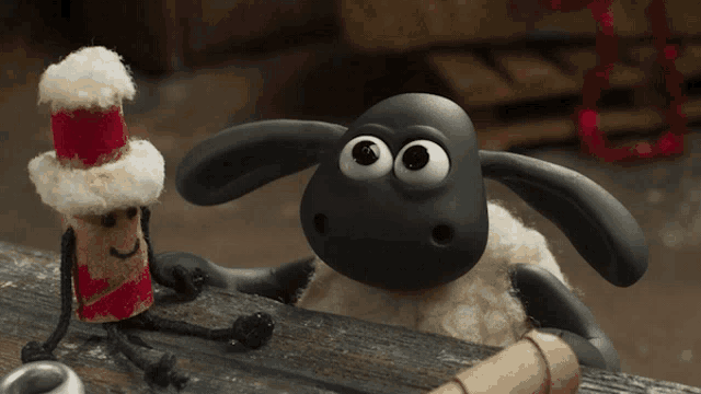 a cartoon sheep wearing a santa hat stands next to a cork man