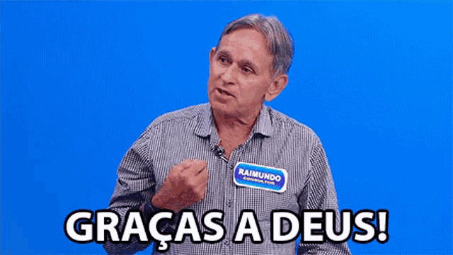 a man with a name tag that says raimundo on it says graças a deus