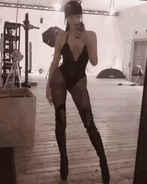 a woman takes a picture of herself in a mirror