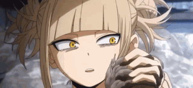 a close up of a anime girl with blonde hair and yellow eyes