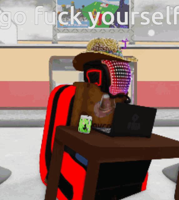 a person wearing a hat and headphones sits at a desk with a laptop and the words go fuck yourself behind them