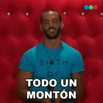 a man is wearing a blue shirt that says birth of todo un monton