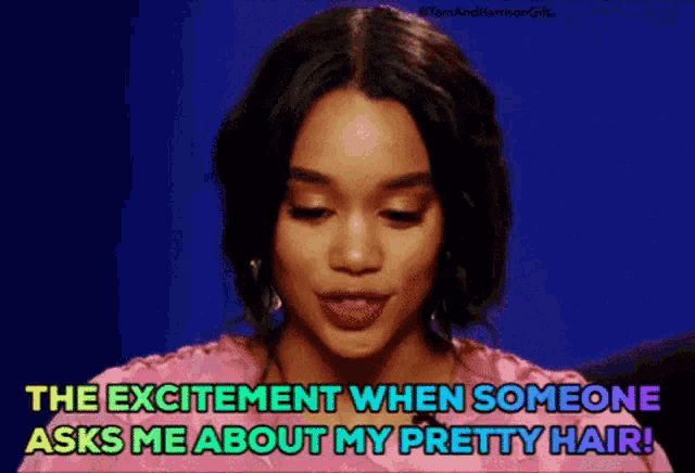 a woman in a pink dress says the excitement when someone asks me about my pretty hair .