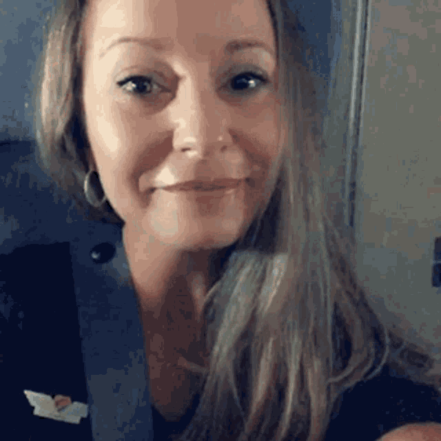 Colleen Coll Wink GIF - Colleen Coll Wink Flight Attendant GIFs