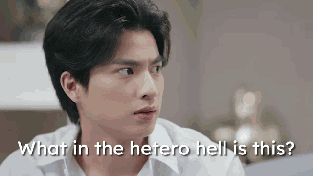 a man in a white shirt says " what in the hetero hell is this ? "